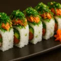 Spicy Lori Maki Spicy tuna, avocado, scallion topped with spicy crab cucumber seaweed salad